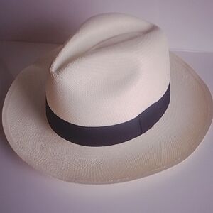 Elegant Cream Fedora with Black Band